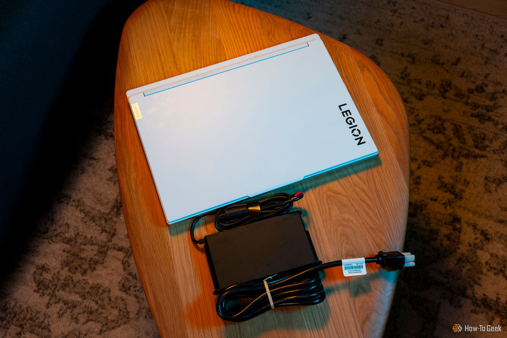 The Lenovo Legion 7i 16 Gen 9 with charger