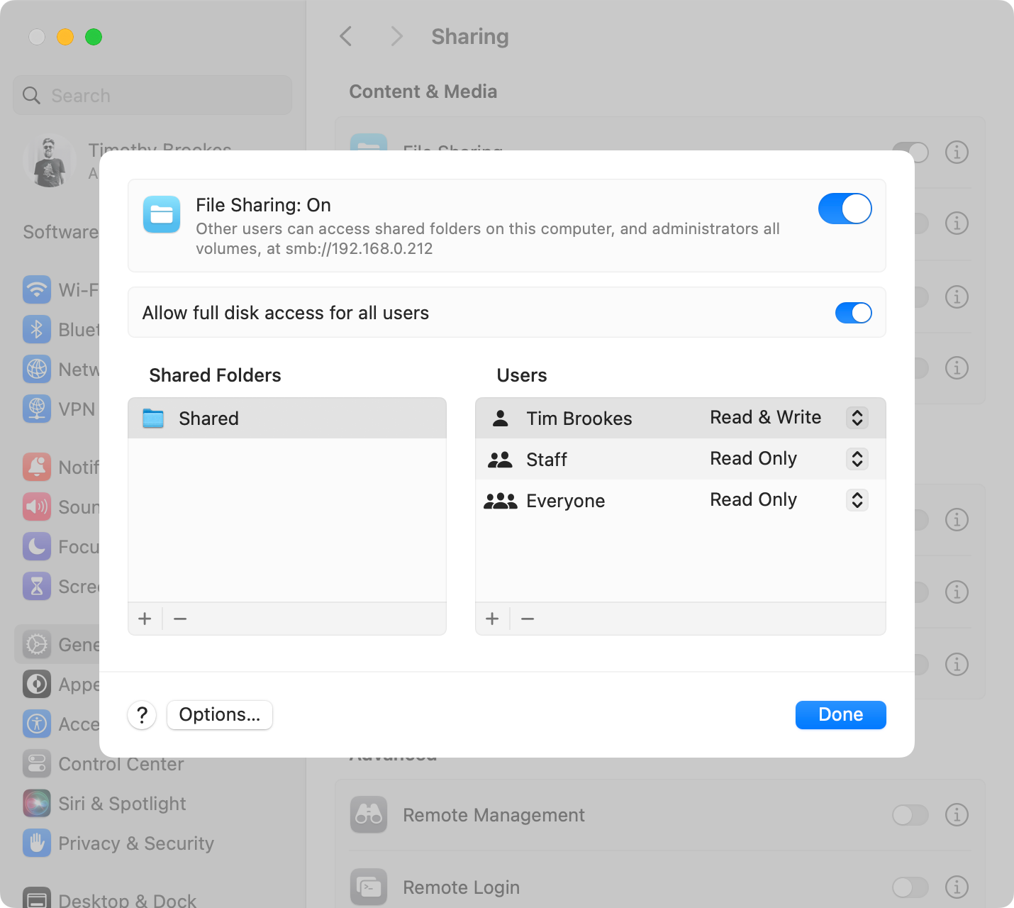 Configuring file sharing on a Mac in macOS Sonoma.