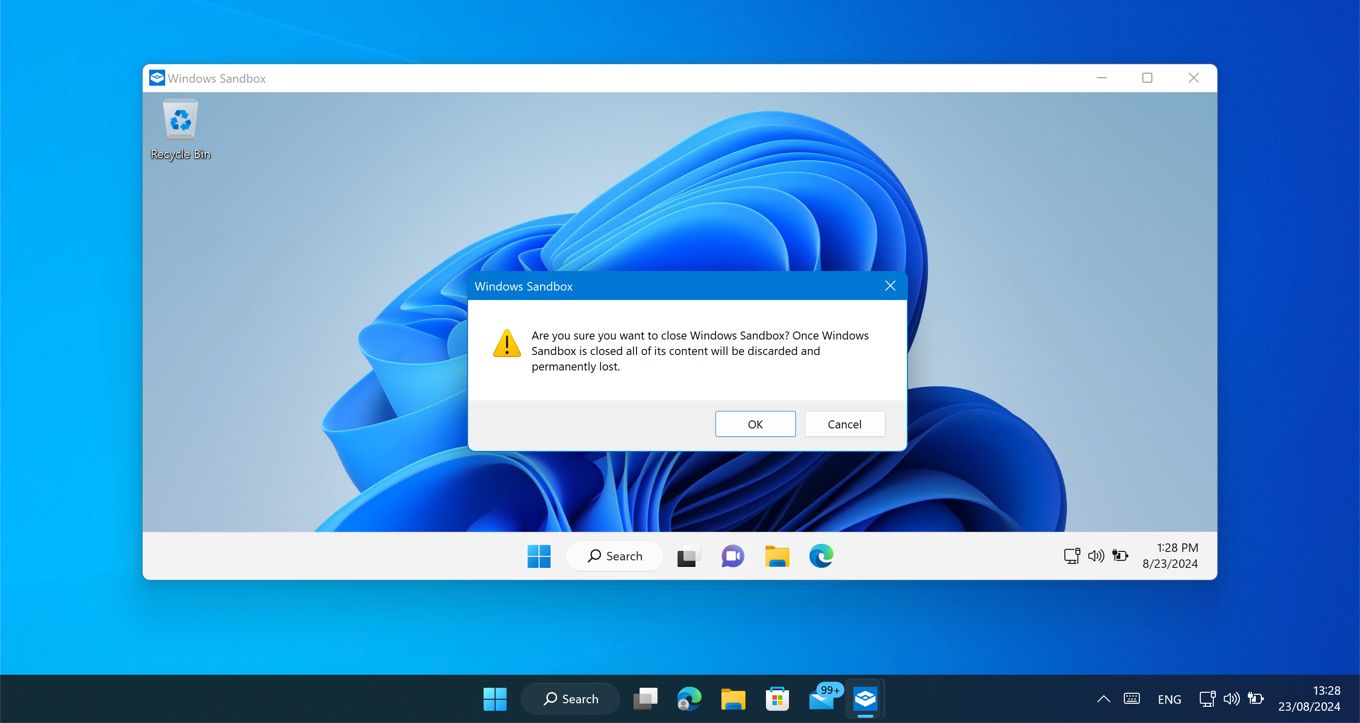 An open Windows Sandbox window on Windows 11, showing a warning prompt about the erasure of data when the sandbox is closed.