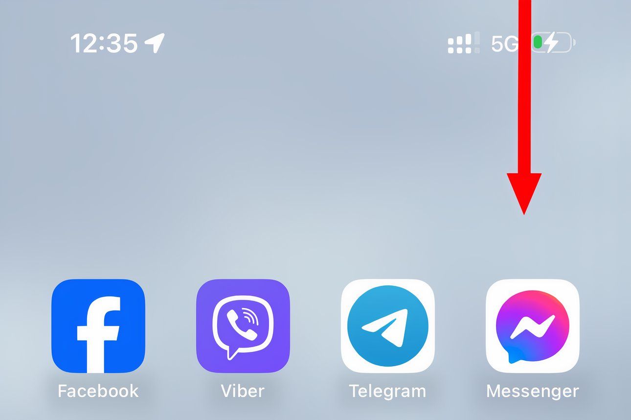 Closeup of an iPhone's Home Screen with the downward pointed arrow in the top-right corner.