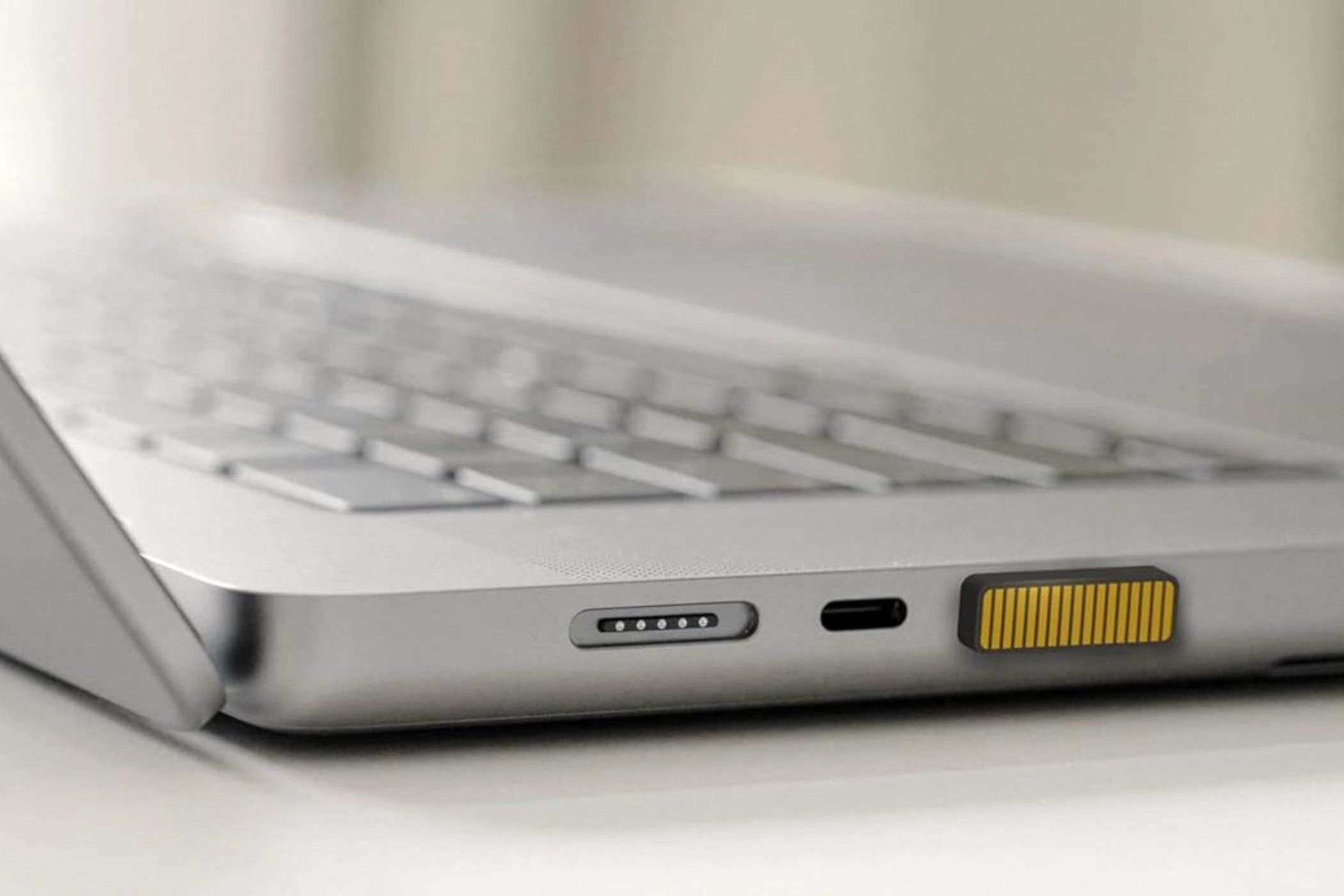 macbook with a SoundSlide inside of a USB-C port