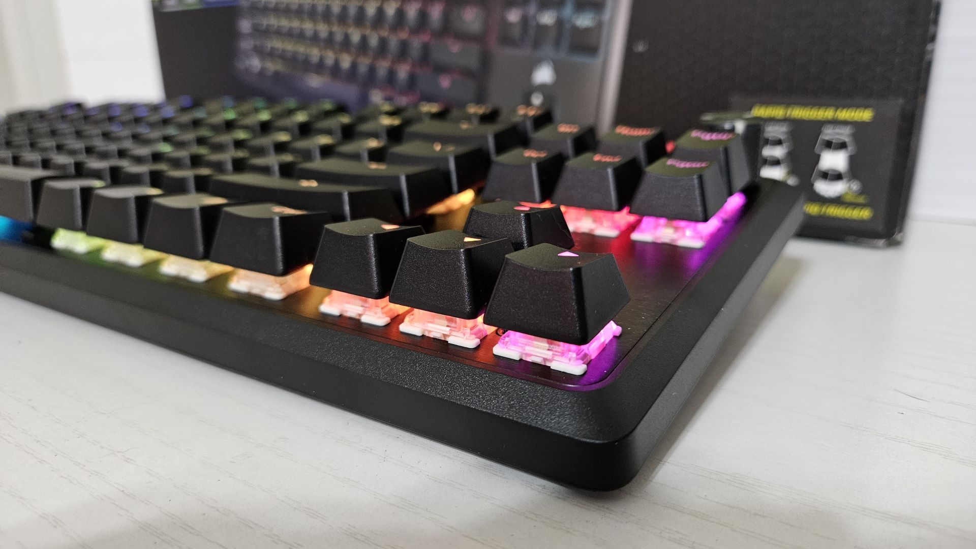 k70-pro-tkl-keycap-gap The Corsair K70 PRO TKL mechanical keyboard, with a focus on the large gaps between the keys and the surface.