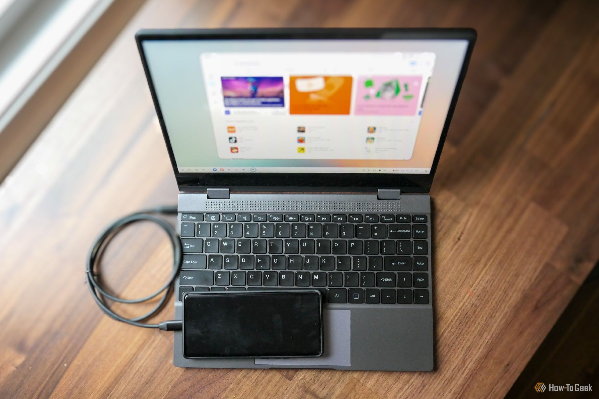 A Moto Edge+ 2023 connected to a UPerfect lapdock.