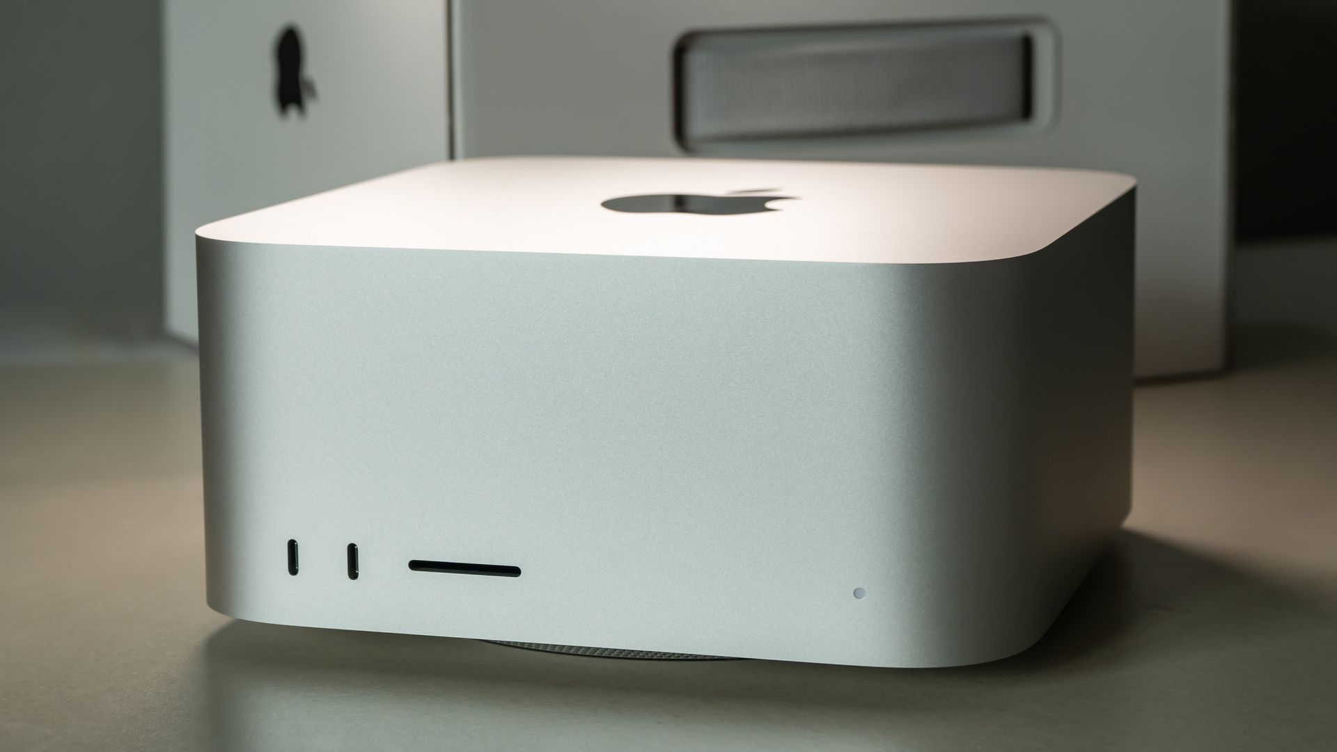Mac Studio computer on a desk.