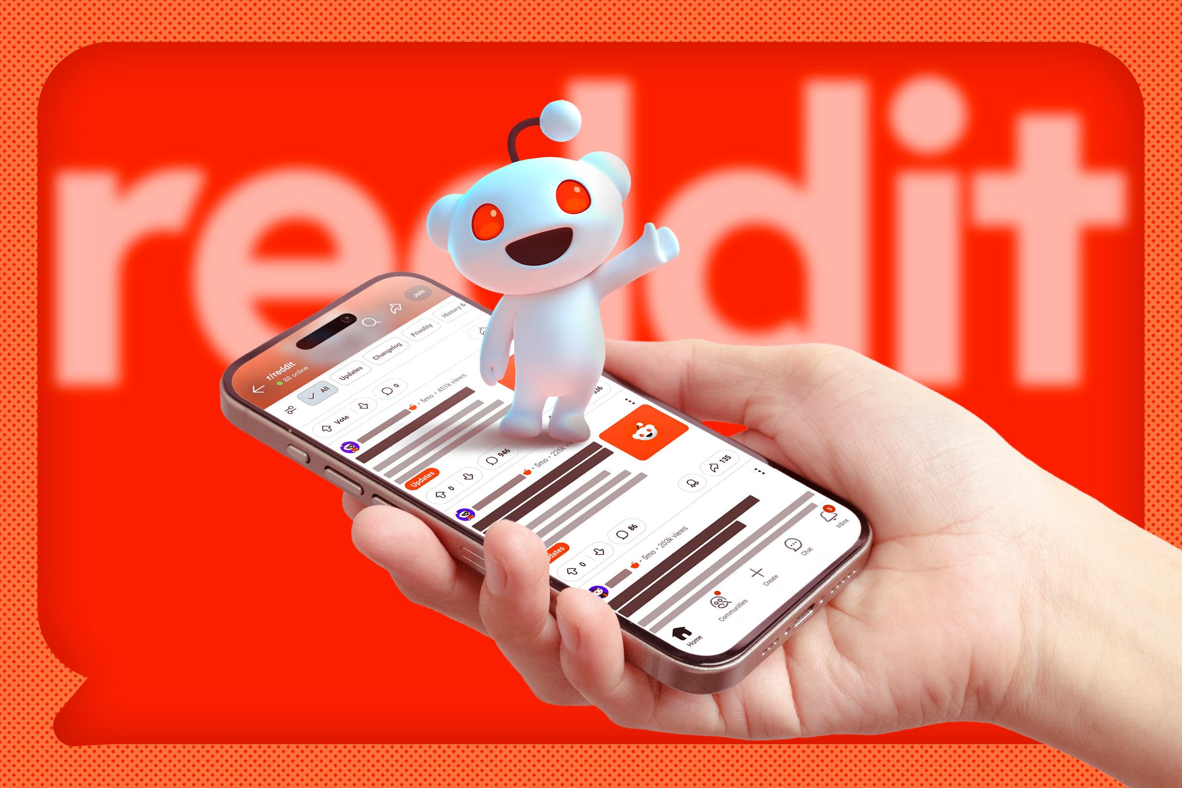 A hand holding a phone with Reddit open, the Reddit mascot on the screen, and the logo blurred in the background.