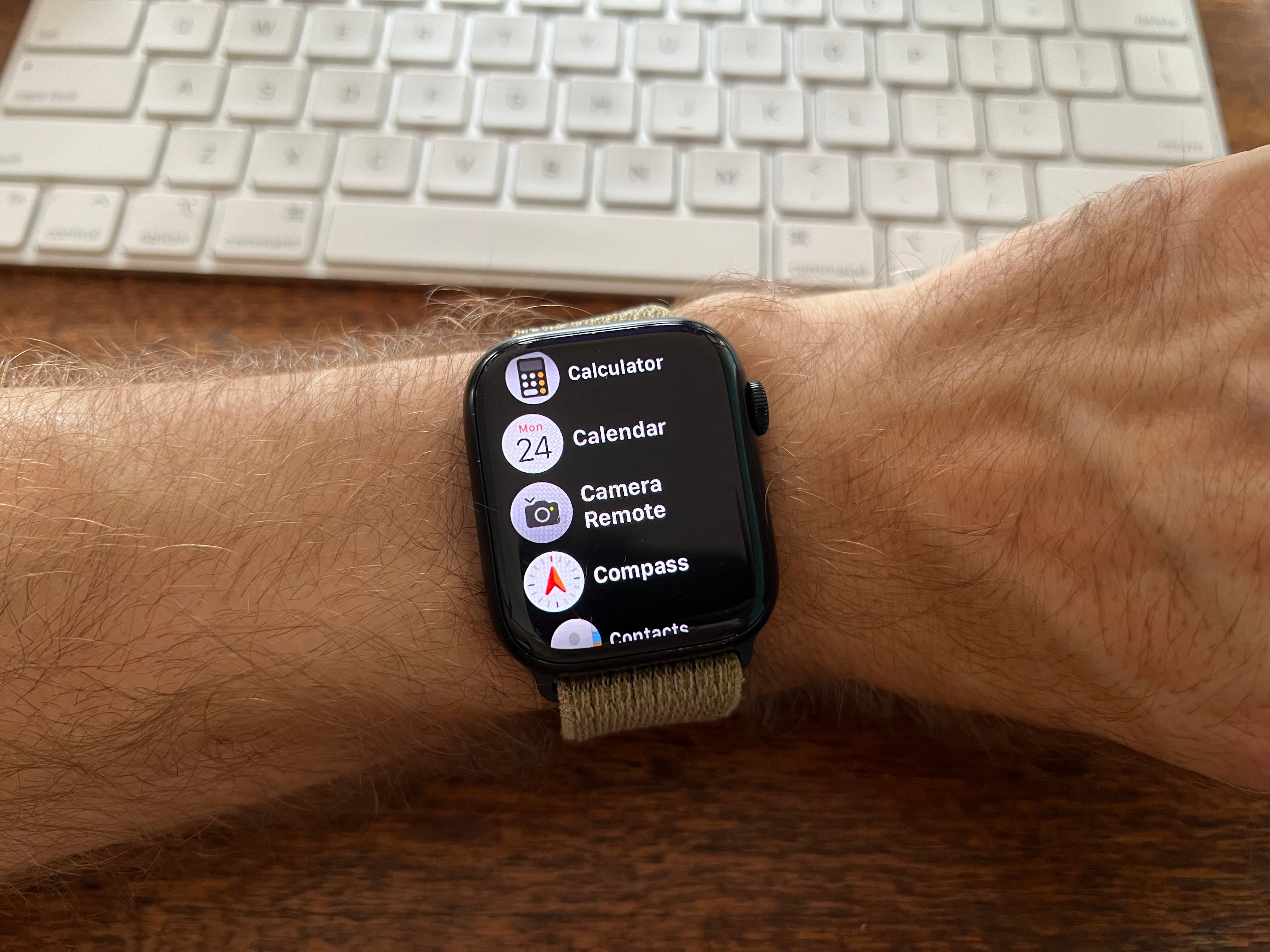 An Apple Watch Series 8 with the Camera Control app highlighted.