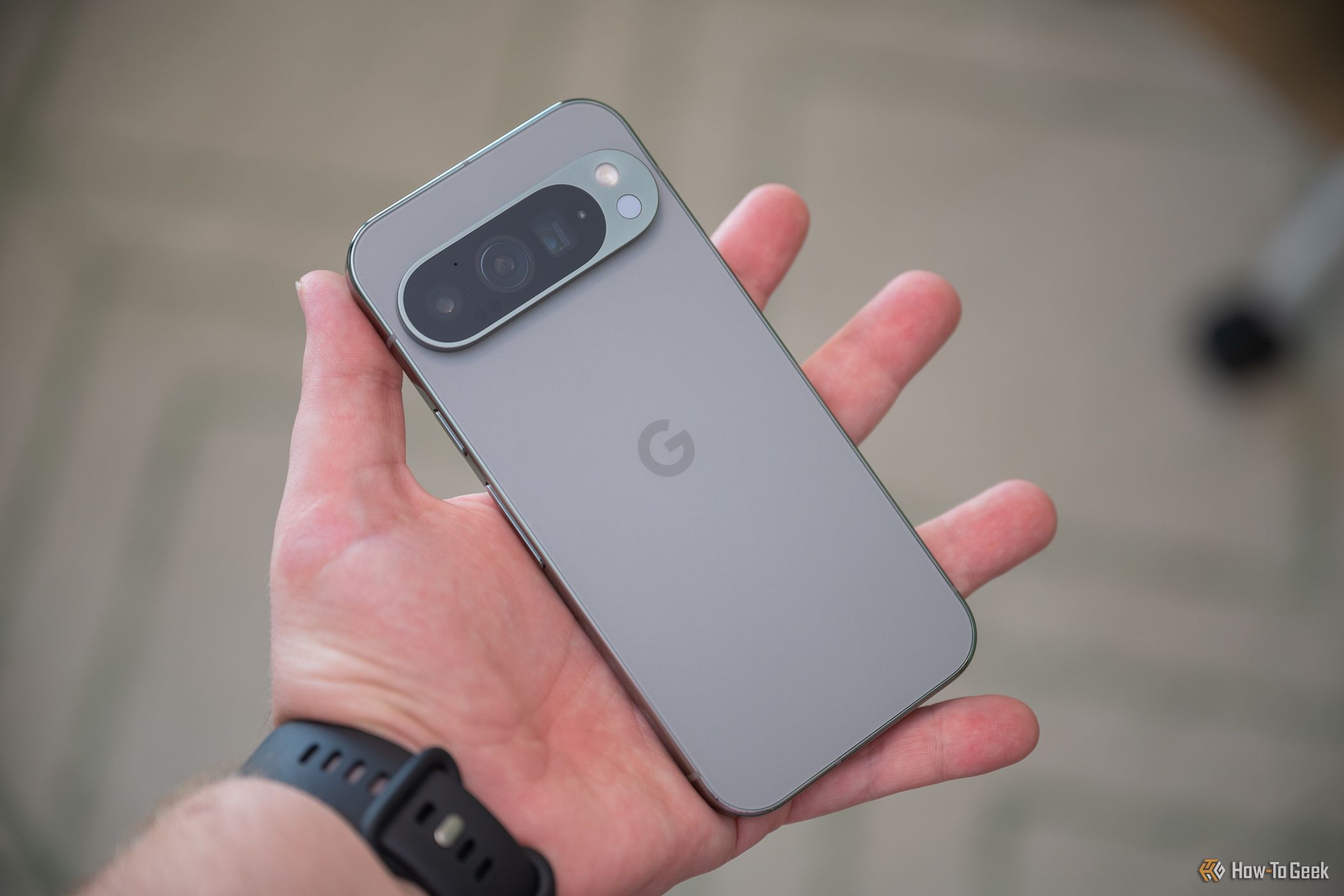 Google Pixel 9 Pro sitting in a person's palm-1