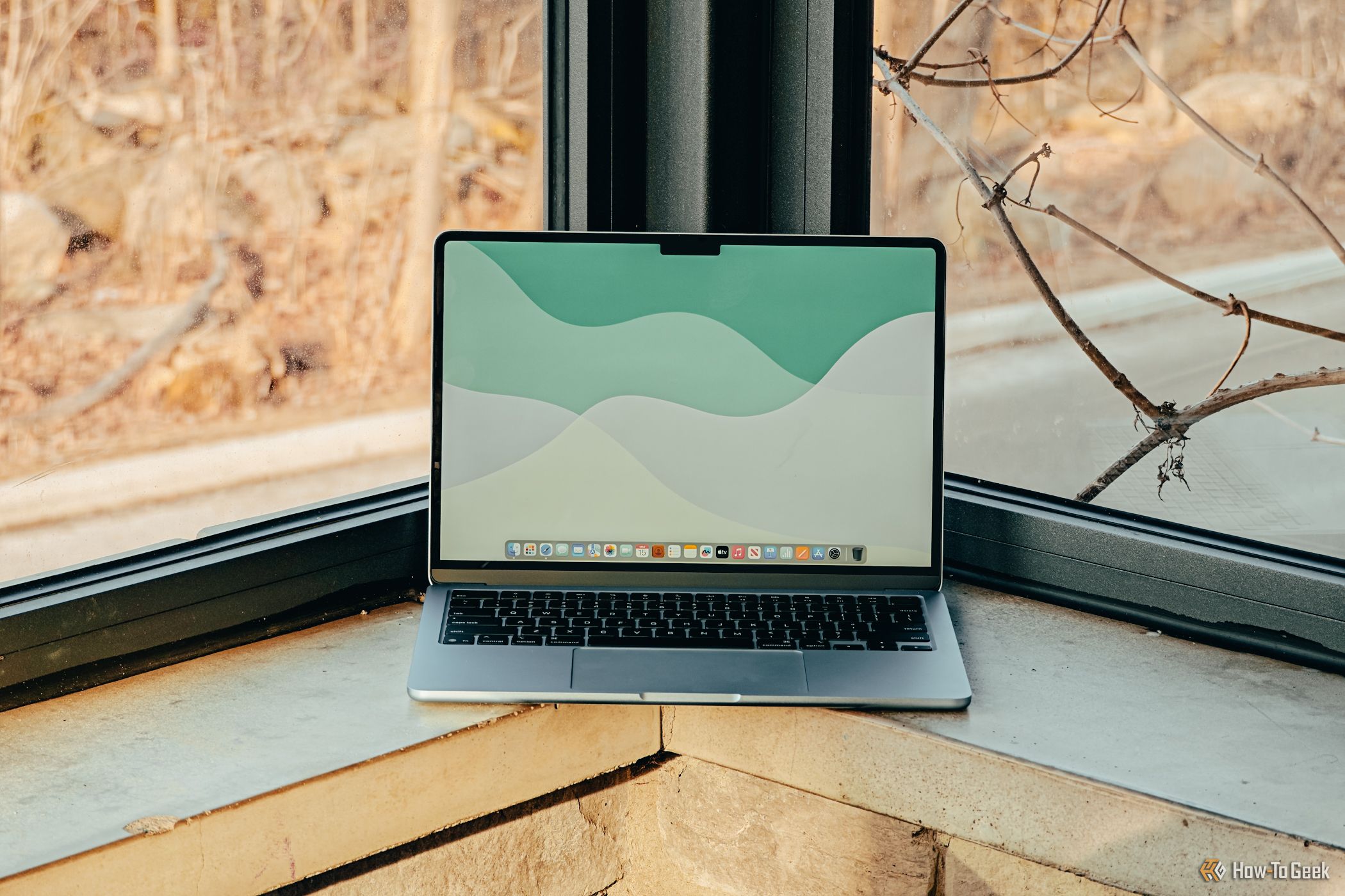 M4 MacBook Air in Sky Blue screen head on on ledge.