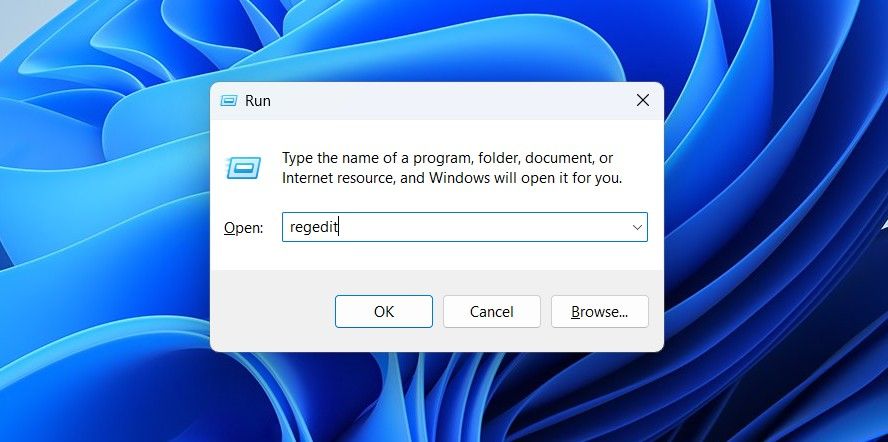 Regedit command in the Run dialog box.