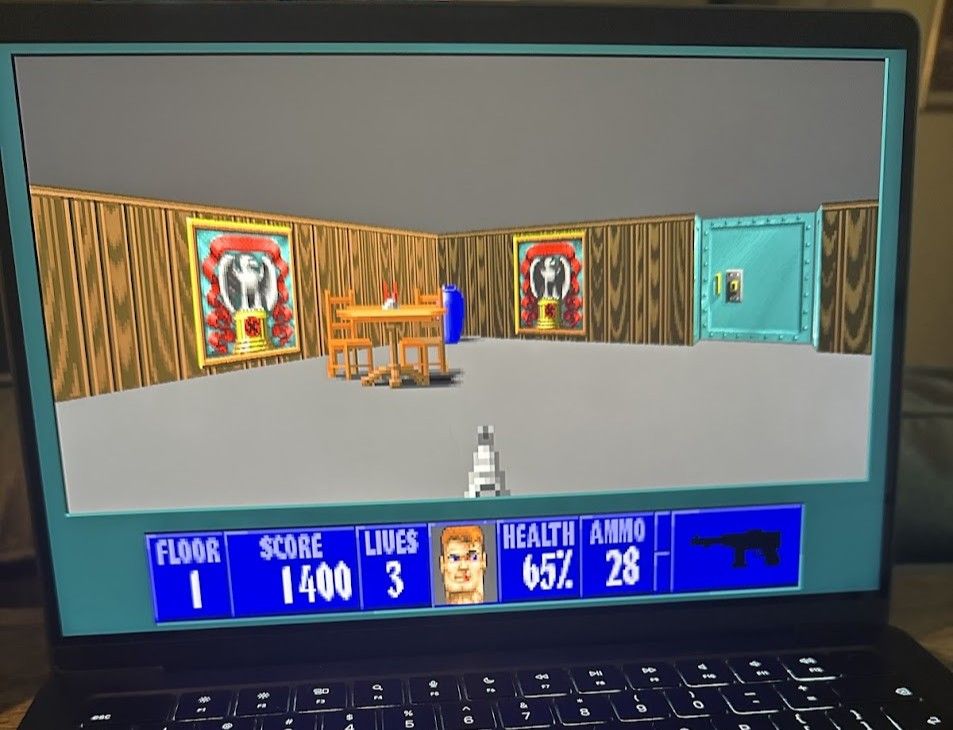 Wolf3D running on a MacBook Pro.