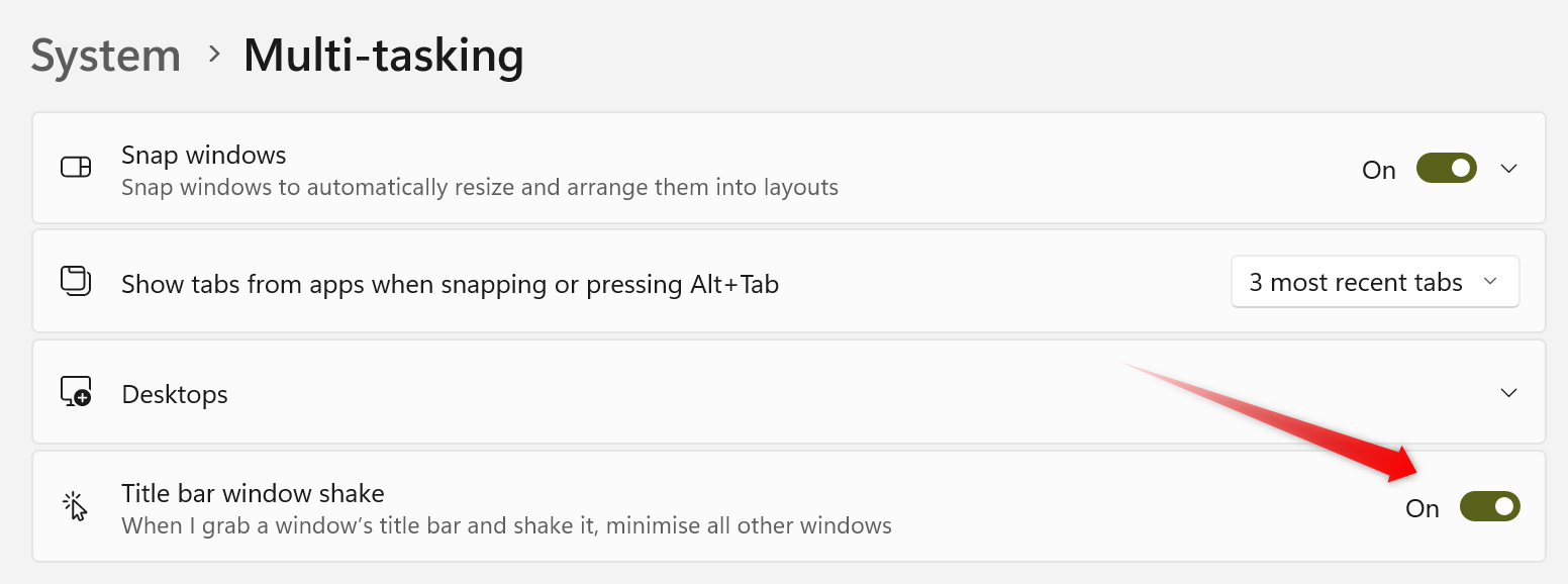 Enabling the Title Bar Window Shake feature on Windows.