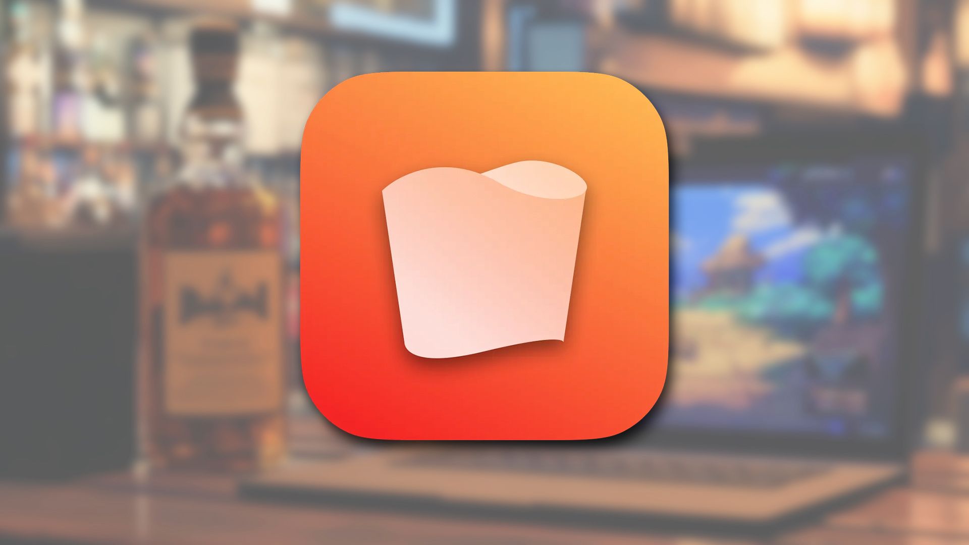 The Whisky logo over an image of a MacBook and a bottle of whiskey.