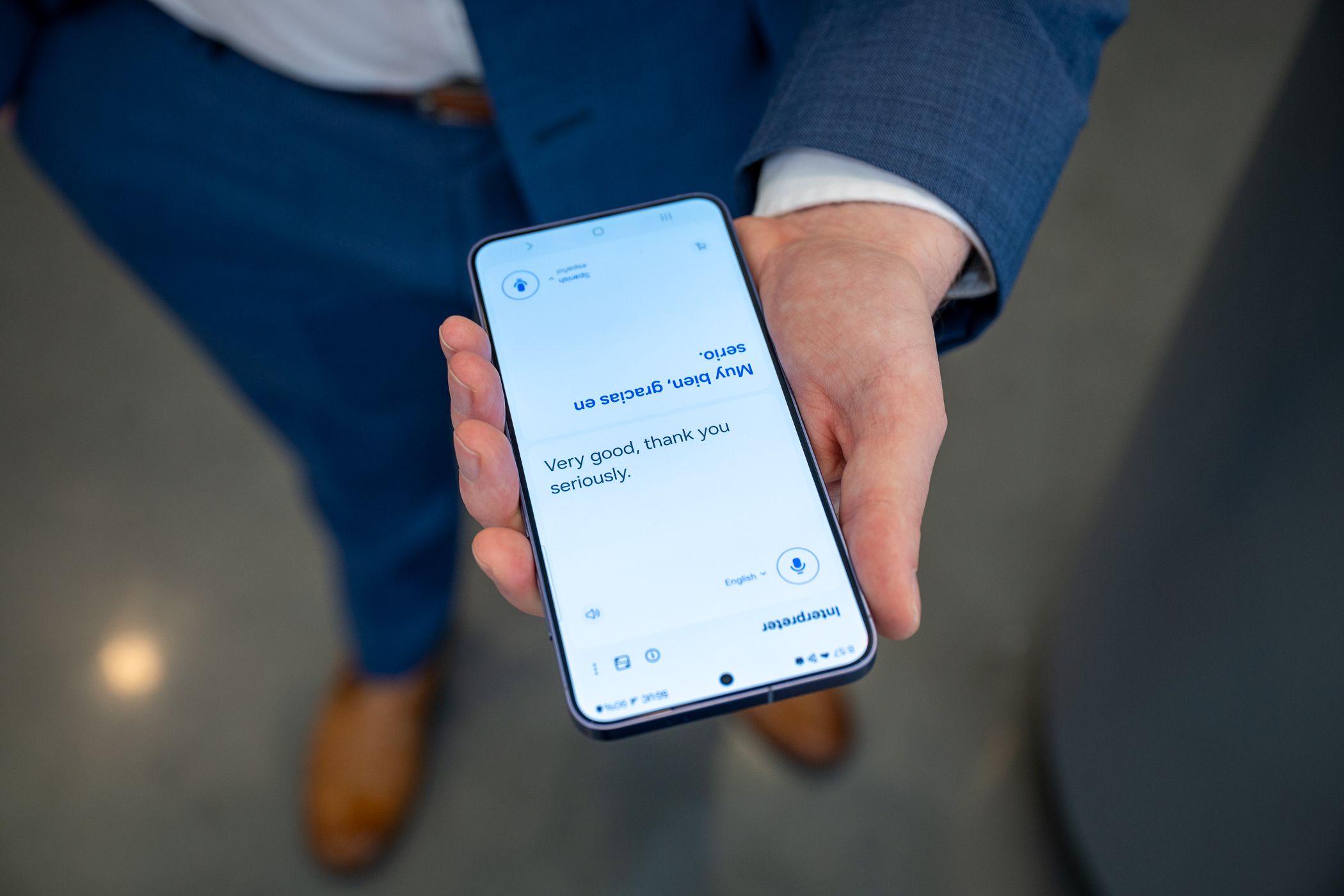 Person using Interpreter mode on the Samsung Galaxy S24.