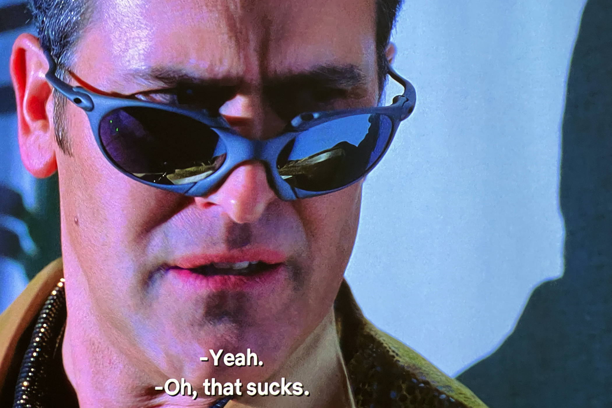 Closeup of the projection screen while watching 2002's 'Spider-Man' on the XGIMI Horizon Ultra with subtitles on screen..