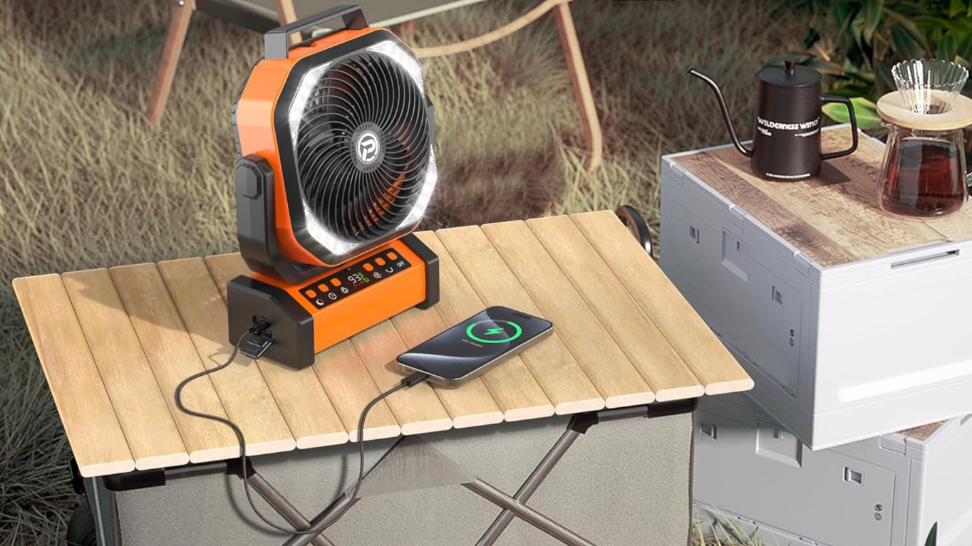 cmyfato fan on camp table.