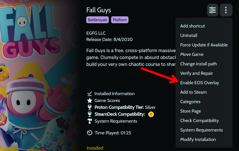 Fall Guys launch page in Heroic Games Launcher with an arrow pointing to the Enable EOS Overlay menu option.