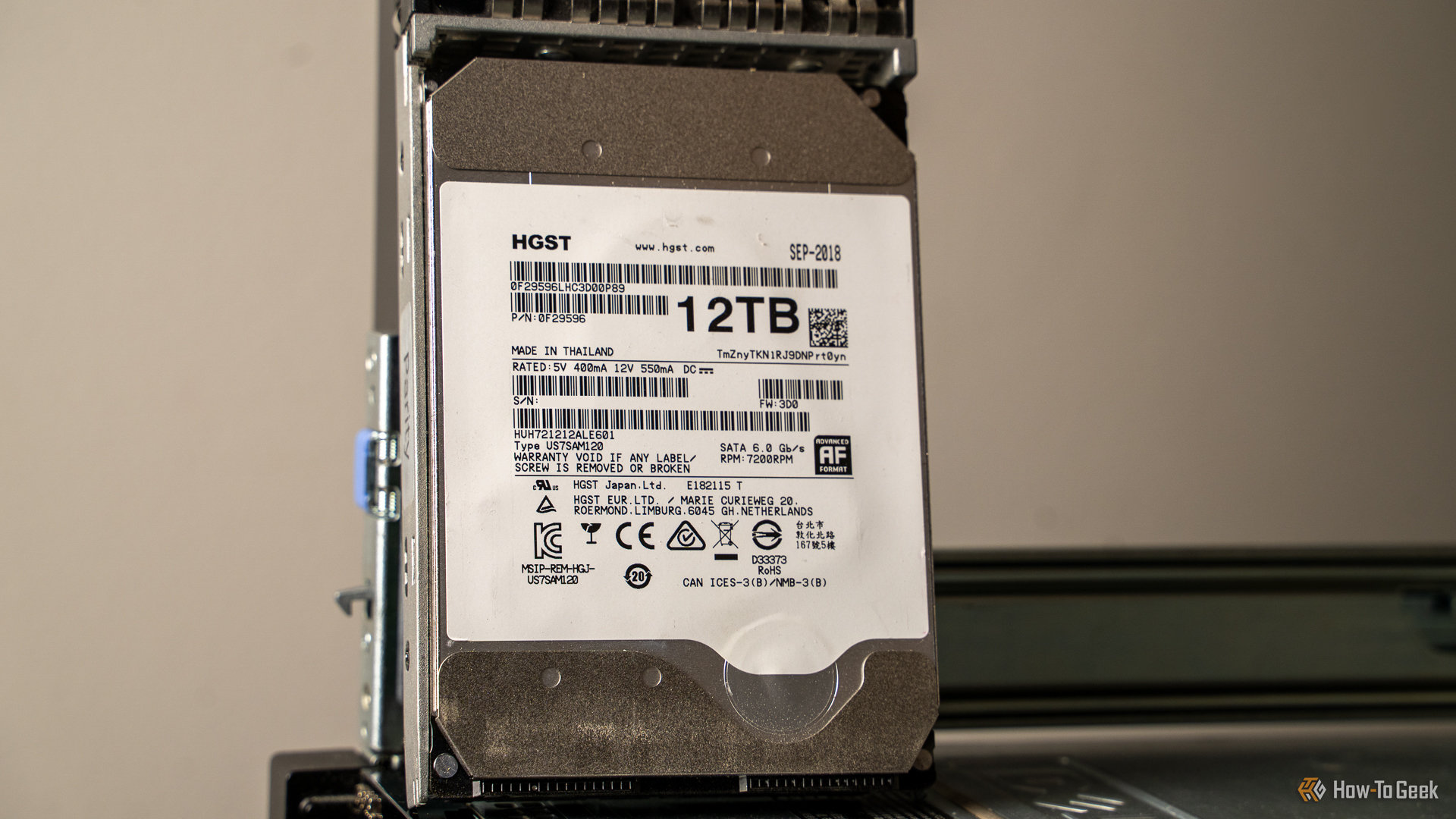A HGST 12TB Helium recertified hard drive.