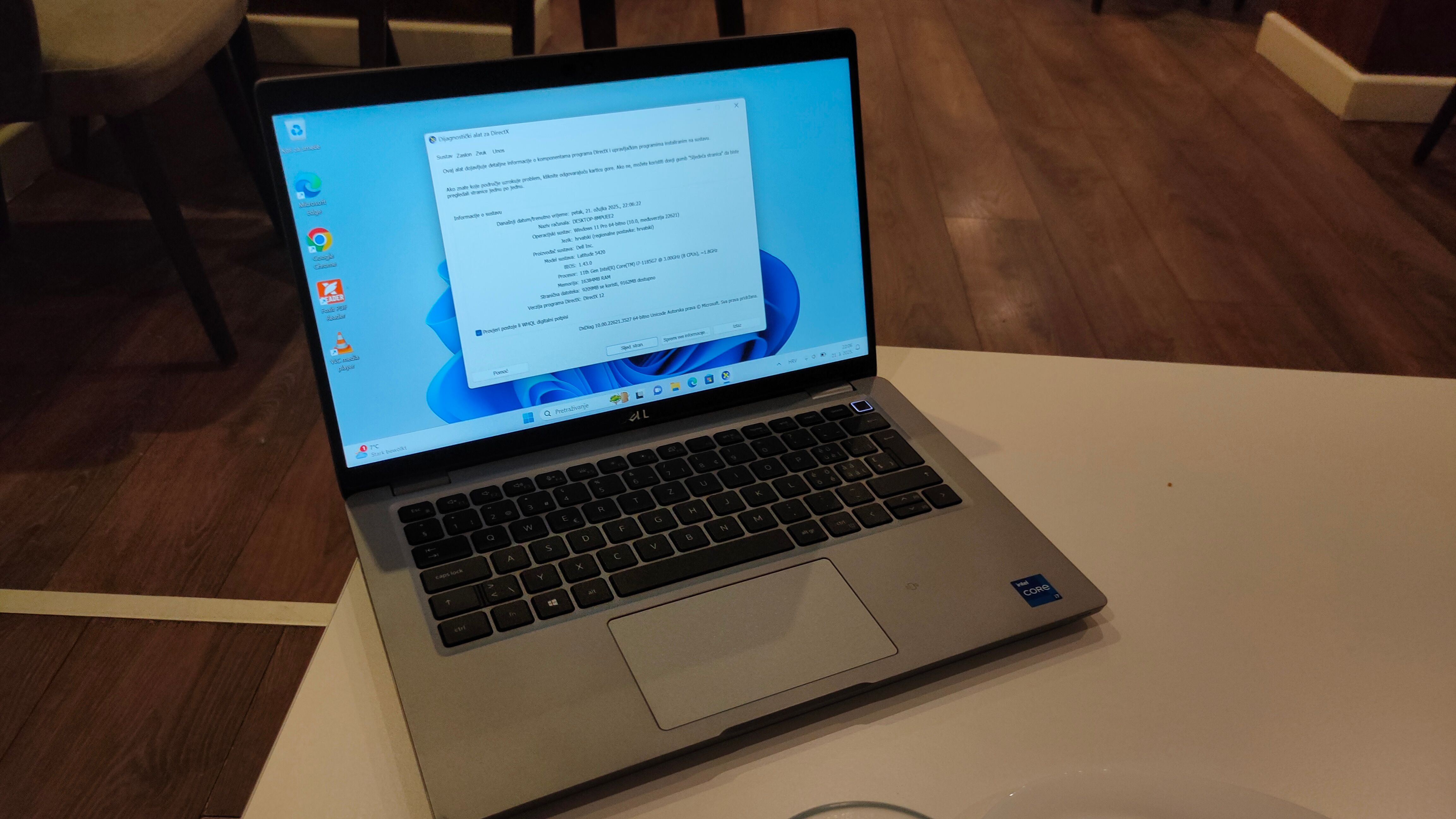 The Dell Latitude 5420 business laptop on a desk.