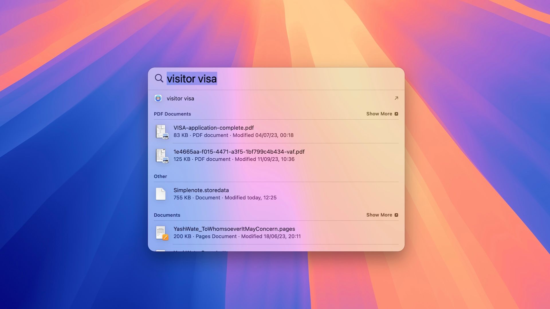 A Spotlght search window on the Mac desktop.