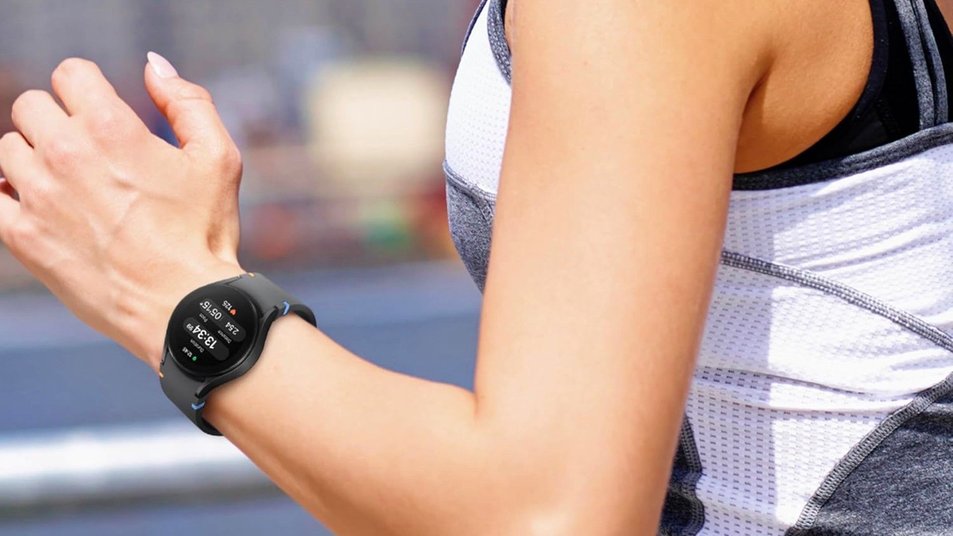 Samsung Galaxy Watch FE in use by woman running