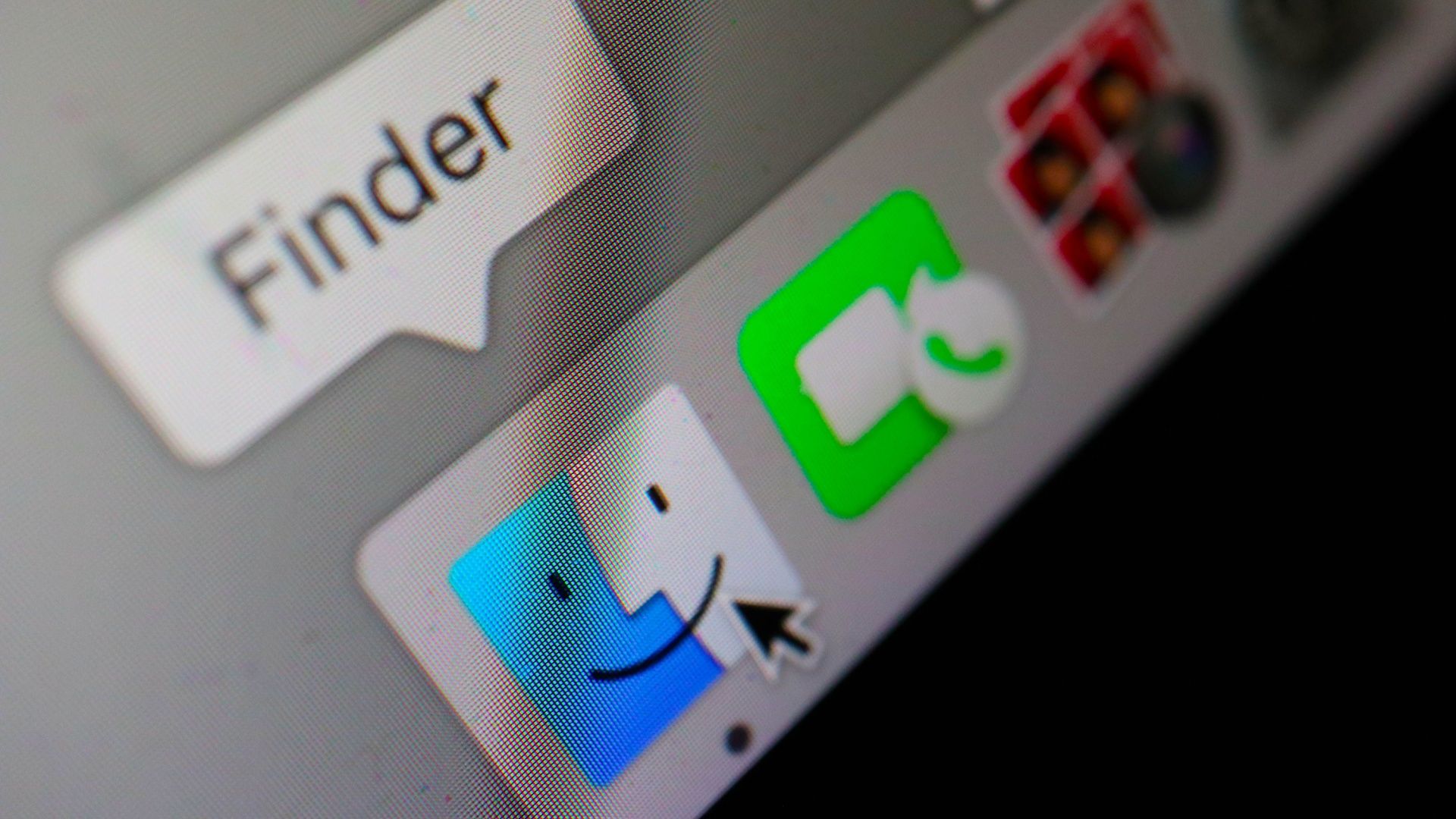 Finder application in a dock on a screen of MacBook, close-up.