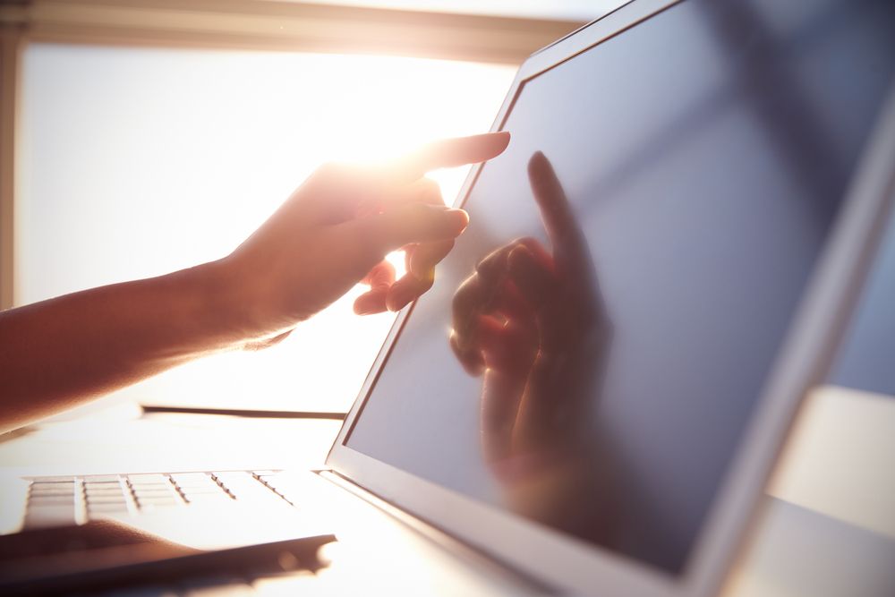 A very clean screen with a backlit hand.
