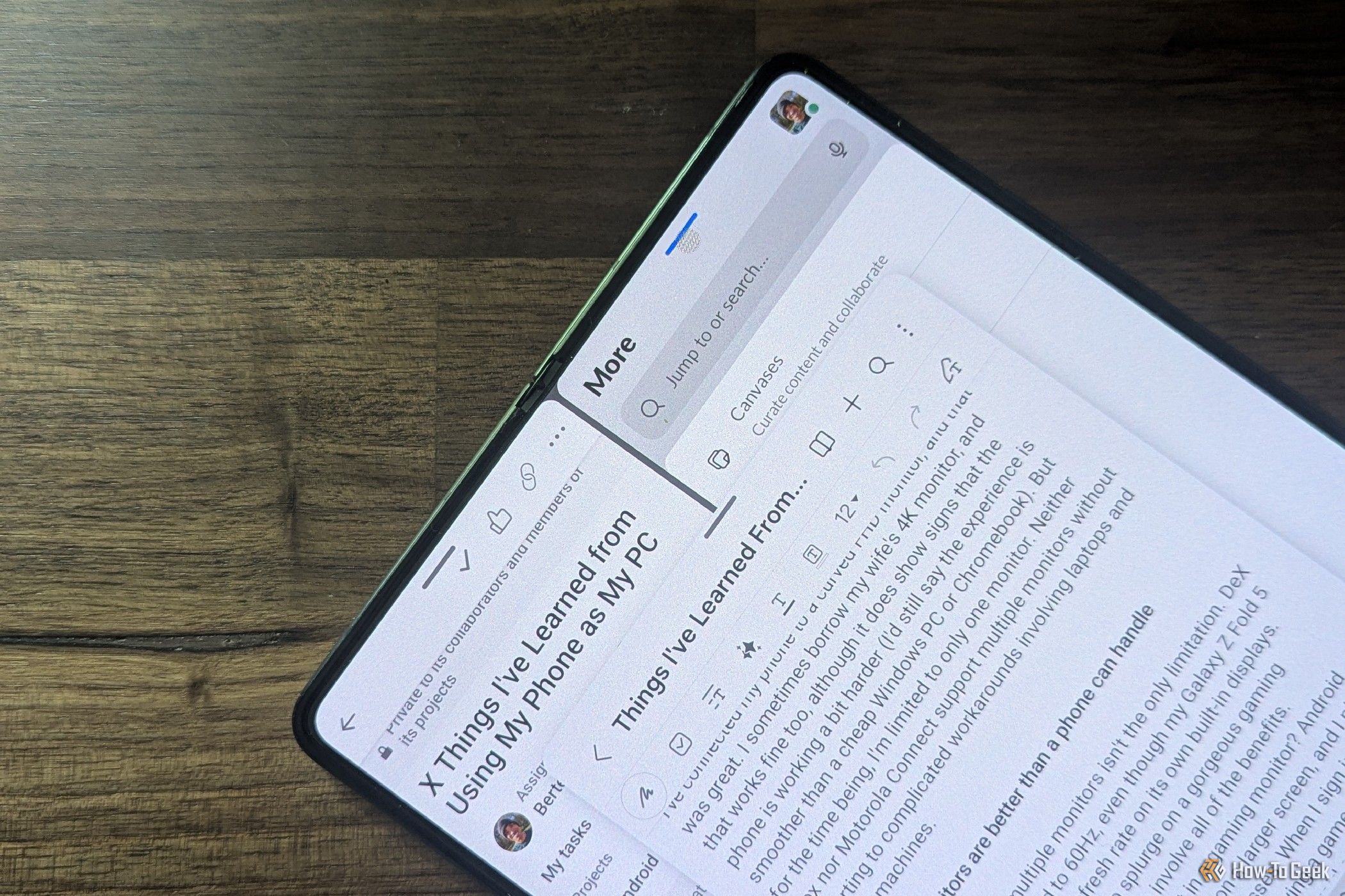 Galaxy Z Fold 5 on a desk with multiple apps open.