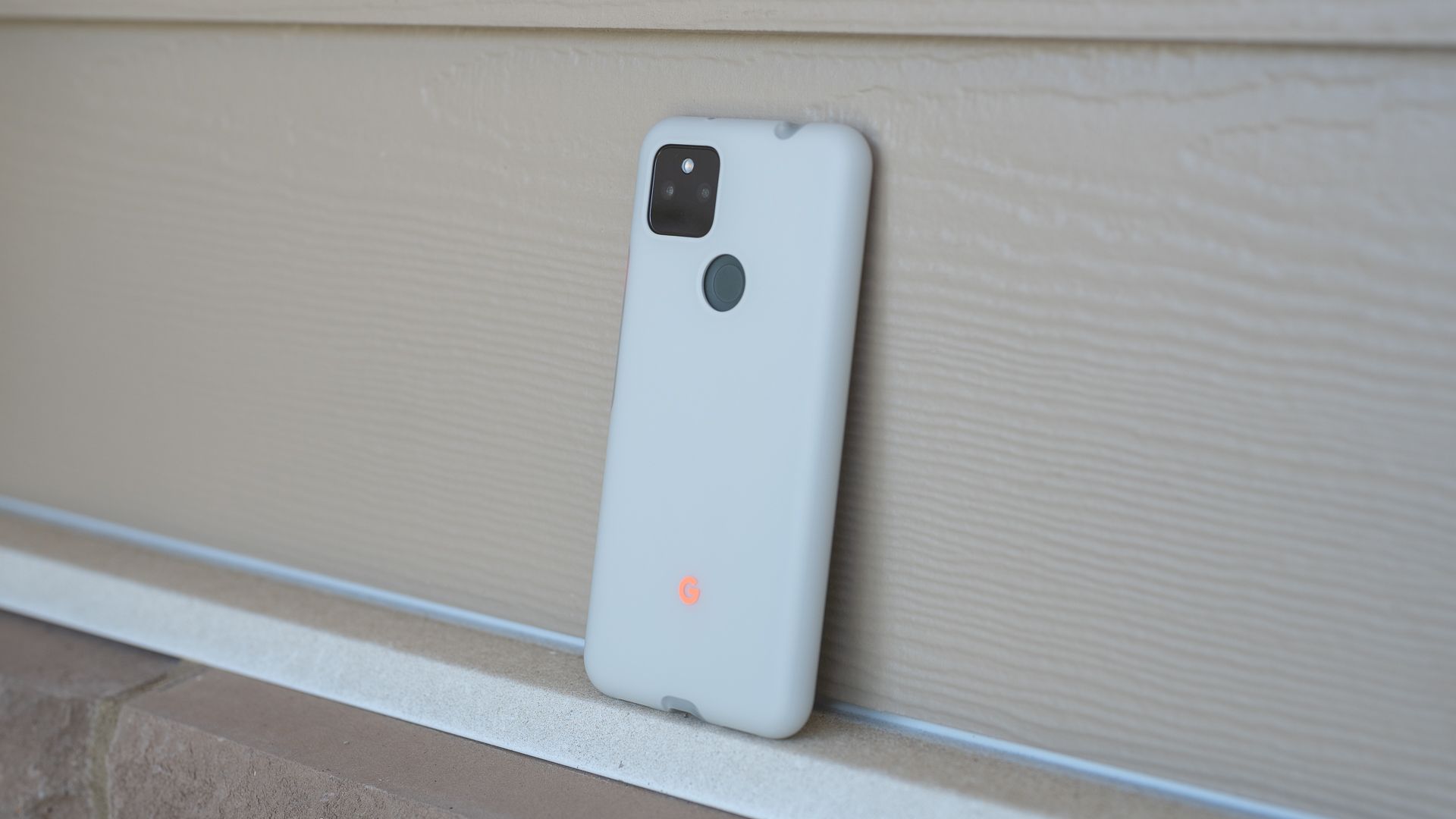 google-pixel-5a-case-leaning-on-wall