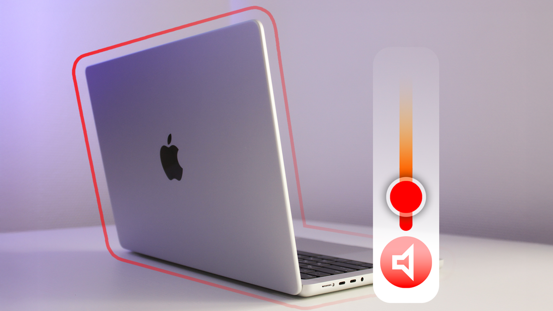 A MacBook with a low volume icon beside it.
