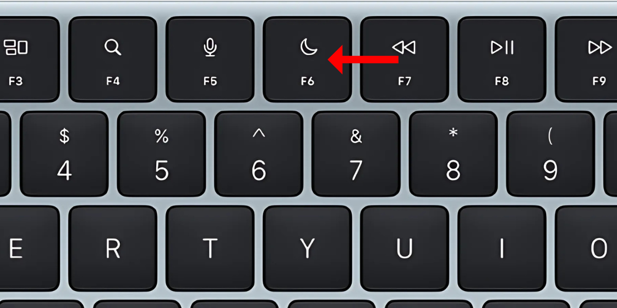 Picture of a Mac's keyboard with an arrow next to the F6 key.