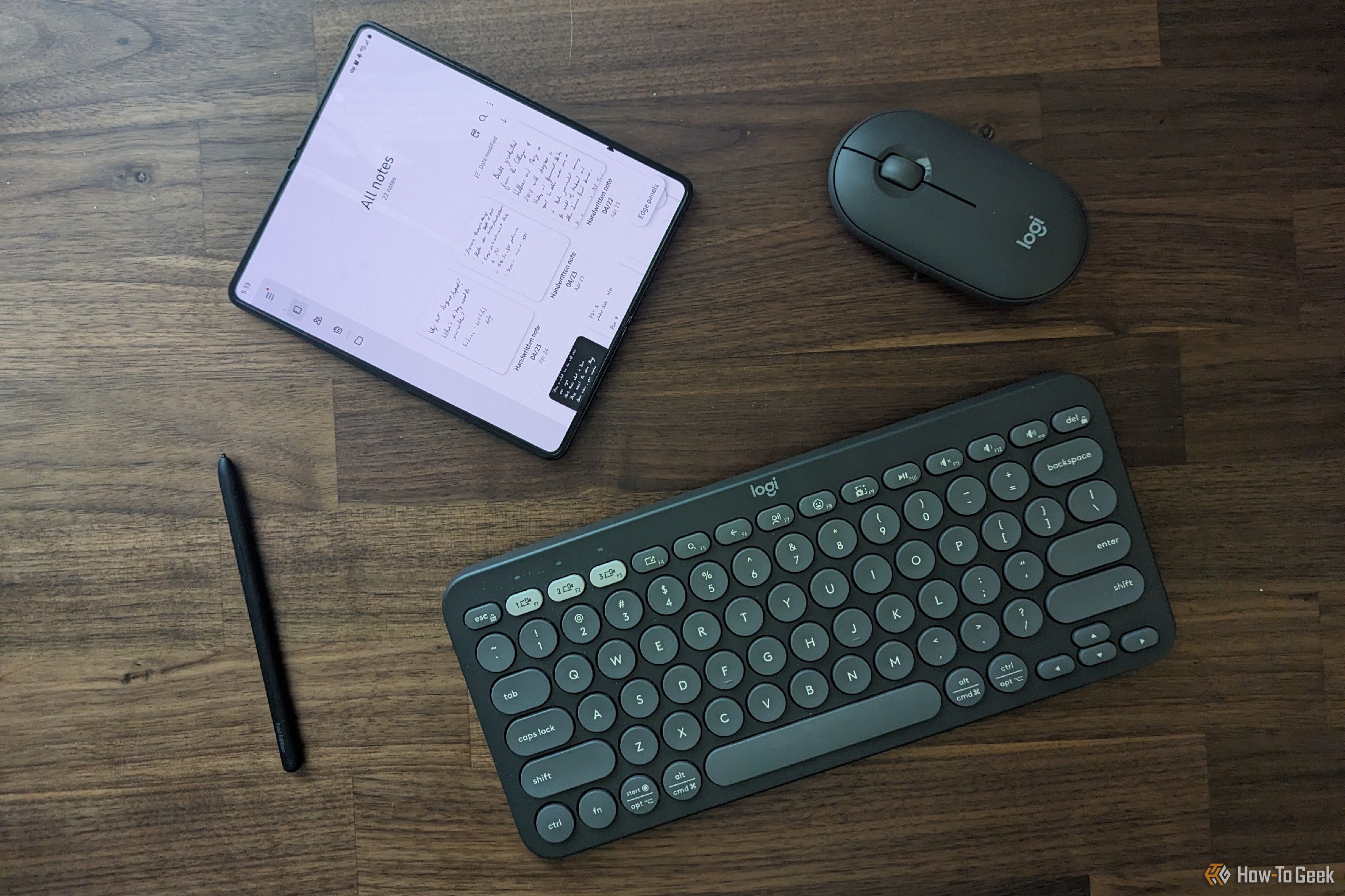 Galaxy Z Fold 5 with stylus, Bluetooth keyboard, and mouse.